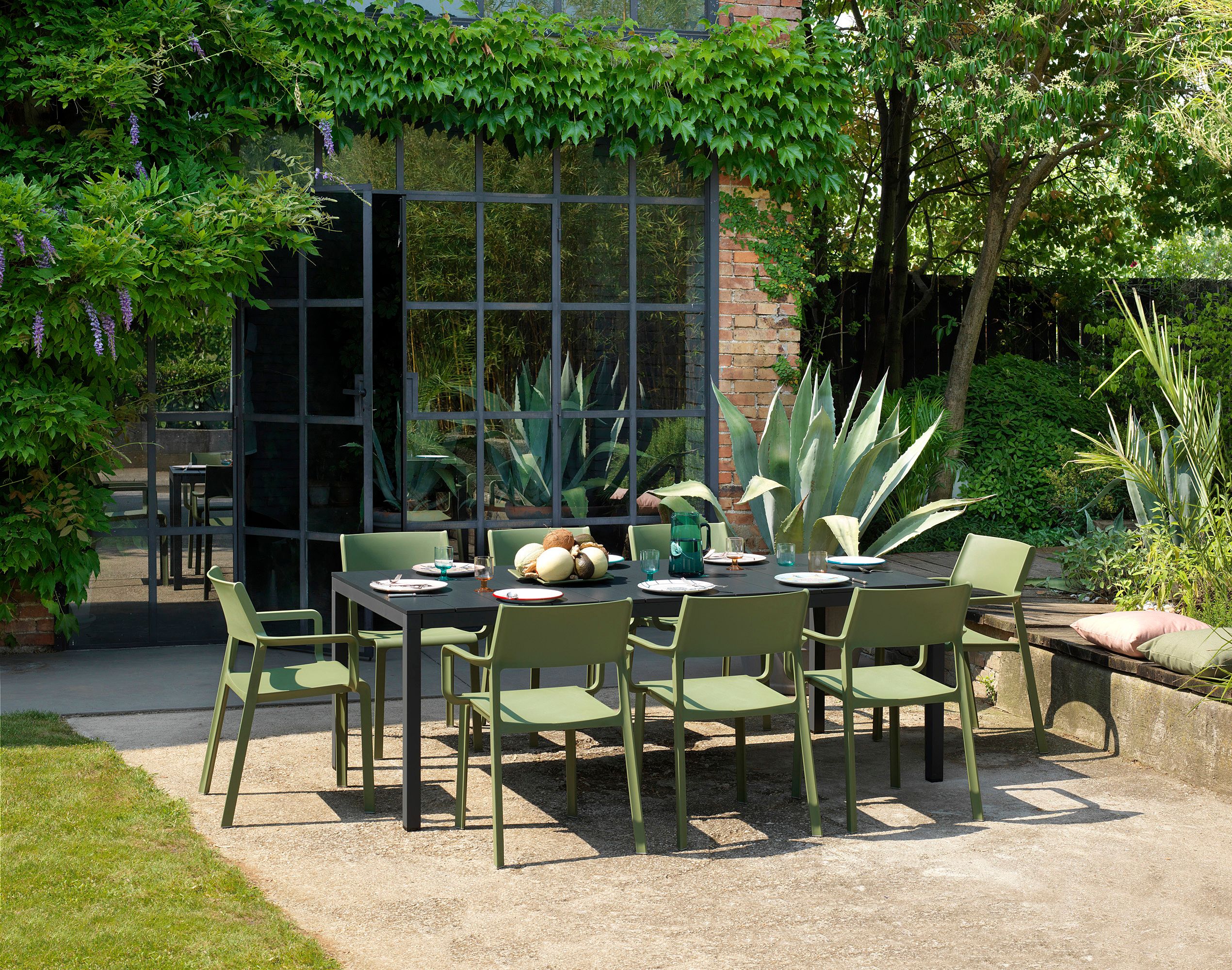 NARDI TRILL ARMCHAIR Black minimalist Plastic outdoor chairs
